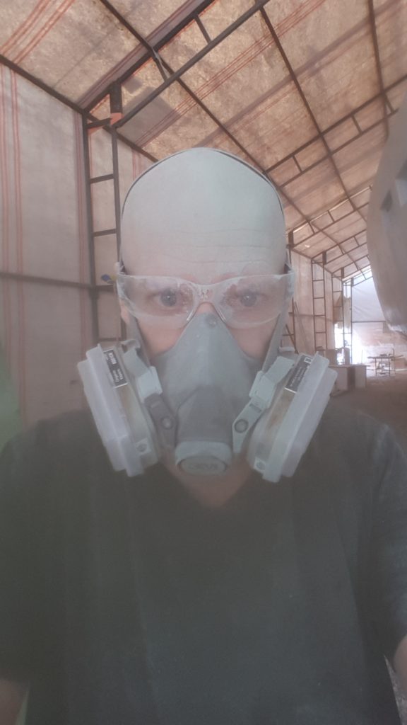 Dennis Rawlusyk covered in dangerous PVC dust